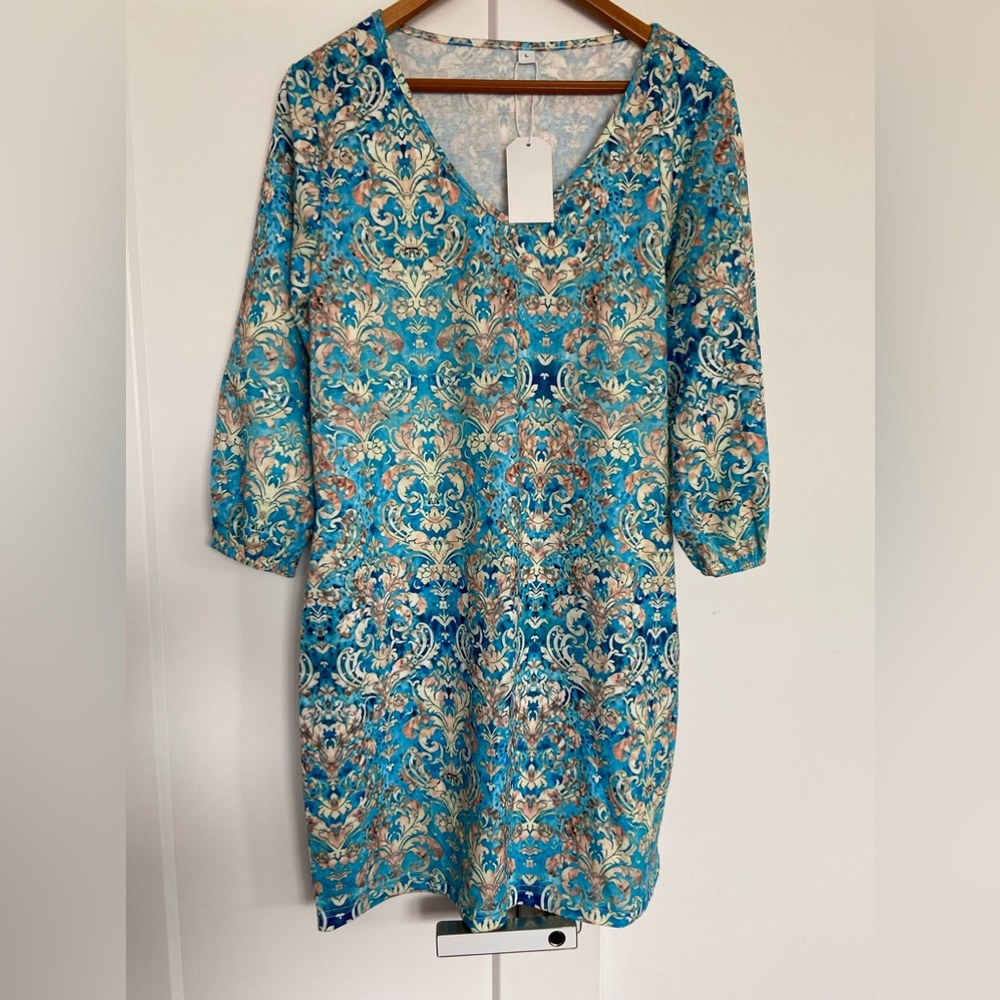 Lovely dress with tags.